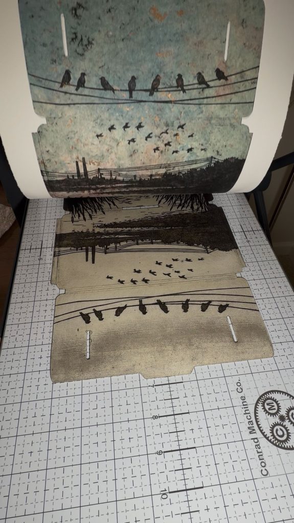 rachel-mentzer-pulling-a-print-on-a-conrad-press